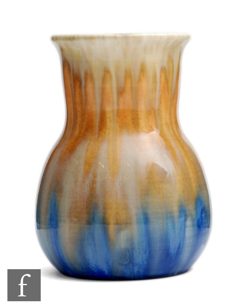Ruskin Pottery - A small crystalline glaze vase of globe and shaft form decorated in a streaked
