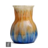 Ruskin Pottery - A small crystalline glaze vase of globe and shaft form decorated in a streaked