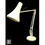 George Carwardine for Angleposie - A white desk lamp with gloss shade and suspension hinged stem, on