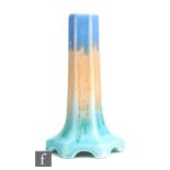 Ruskin Pottery - A crystalline glaze lamp base decorated in a streaked blue to orange to green,