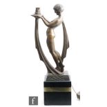 Limousin - An Art Deco bronze lamp base modelled as a stylised female nude with drapes from her back