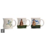 Moorcroft Pottery - Three later 20th Century mugs comprising two for 1986 decorated with tubelined