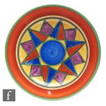 Clarice Cliff - Original Bizarre - A large circular plate circa 1927, radially hand painted with a