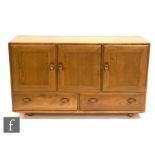 Ercol Furniture - A 'Windsor' blonde elm and beech sideboard, model 468, fitted with an