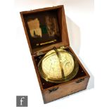 A Huston Star globe by H.Hughes & Son London 1920, set into a brass scale frame and ebonite panel,