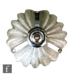 A 1930s Art Deco light fitting, to include shell shaped frosted glass ceiling shade with chains,