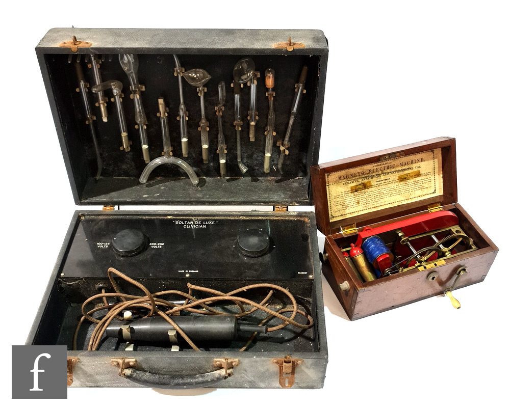 A Victorian mahogany cased shock machine, width 25cm, and a similar later machine titled ? Soltan De