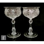 A pair of early 20th Century Thomas Webb & Sons Rock Crystal style champagne glasses