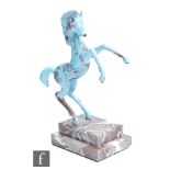 An Istvan Komaromy figural lamp work group of a prancing stallion in tonal blue opalescent glass,