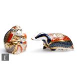 Two boxed Royal Crown Derby paperweights comprising Moonlight Badger and Monkey and Baby, both