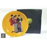 A limited edition Nybro crystal glass yellow Submarine 'Subguys' platter, in original Apple Corps.