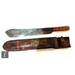 A World War Two machete and leather scabbard, the handle stamped with crows foot and no 8, the