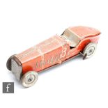 A Mettoy tinplate clockwork race car, in red with lithographed detail in white, racing number 3,