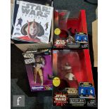 A collection of assorted Star Wars merchandise, to include Thinkway Darth Maul and Qui-Gon Jinn