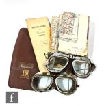 Two pairs of metal framed 1920s or earlier motoring goggles, a Mercator instrument in leather case