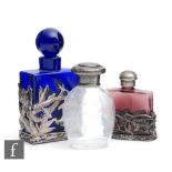 A later 20th Century blue glass scent bottle or rectangular form mounted to a pewter sleeve with