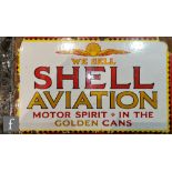 A double sided enamel advertising sign for Shell Aviation, yellow and red lettering 'We Sell Shell