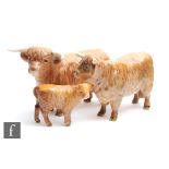 Three Beswick cattle comprising a Highland Cow model 1740, S/D, Highland Bull model 2008, S/D,,