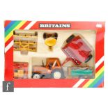 A Britains 9591 1:32 scale Fiat Tractor and Implement Set, boxed.