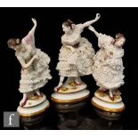 Three 20th Century Volkstedt Rudolstadt Dresden lace models of dancers, each in elaborate dress with