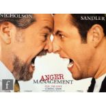 A large collection of film posters of various genres, to include Anger Management, High Heels and