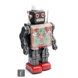 A Japanese Horikawa Gear Robot, battery operated tinplate, grey body with clear chest revealing