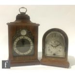 Two 20th Century reproduction walnut veneered Georgian style miniature bracket clocks, the first