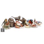 Five assorted Royal Crown Derby paperweights modelled as various birds, all with printed marks and