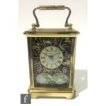 A Halcyon Days Enamels limited edition Astrological Millennium carriage clock, the dial detailed