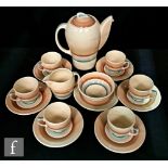 A late 1930s Art Deco Susie Cooper Kestrel shape Wedding Bands coffee set comprising coffee pot, six