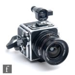 A 1980 Hasselblad SWC/M medium format Camera, chrome, serial number RS 142493, film back RS 3178782,