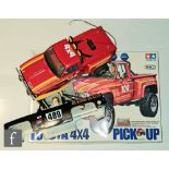 A Tamiya RA1028 1:10 scale Toyota 4x4 Pick Up Truck, completed, with box and additional shell.