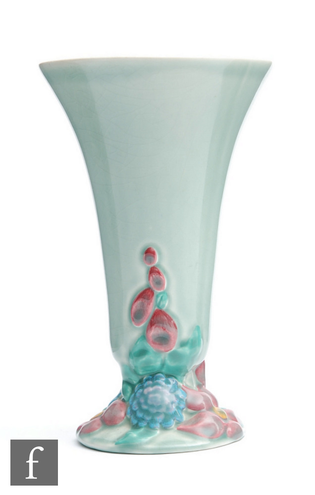 A late 1930s Clarice Cliff My Garden vase of footed trumpet form, the base relief moulded with