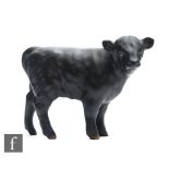 A Beswick Aberdeen Angus Calf model 1827A in matt black, gilt stamp.