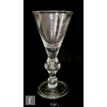 An early 18th Century heavy baluster form goblet circa 1710, the heavy solid bottom conical bowl