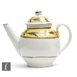 A small late 18th to early 19th Century Leeds creamware teapot decorated with a yellow band to the