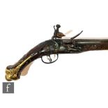 A late 18th to early 19th Century flintlock holster pistol, indistinctly signed to lock possibly L