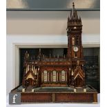 An early 20th Century and later constructed large scale stained pine model of a Gothic cathedral,