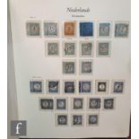 A collection of Netherlands postage stamps, dating from 1852 through to the 1970s, all in three