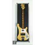 A Rickenbacker 1978 model 4001 electric bass guitar, made in USA, in mapleglo with white