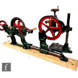 An improved 1891 No 2 patented hand crank operated lathe, later painted red and green, on wooden