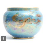 A 1930s Art Deco Crown Devon Lustrine jardiniere decorated with mermaids swimming amidst fish and