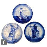 Three early 20th Century Royal Doulton Flo Blue wall or cabinet plates, the first decorated with a