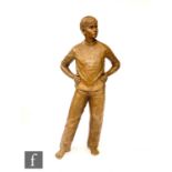 ANN HOGBEN (CONTEMPORARY) - Life size statue of a standing boy with hand on hip, bronze effect