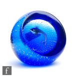 A William Manson for Caithness glass paperweight, internally decorated with a lampwork leaping