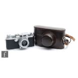 A 1951-52 Ernst Leitz Wetzlar Leica IIIF rangefinder camera, serial number Nr. 581122, with Ernst