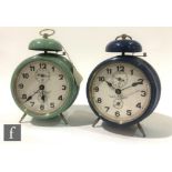 Two enamelled 1930s cased bedside clocks each with subsidiary dials by A.Griffiths Cradley Heath, in