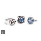 Three Caithness rings, each decorated with miniature paperweight with concentric millefiori cane