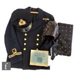 A Royal Naval Air Service jacket with peaked cap and flying helmet from Lieutenant P.C Hogarth R.N.