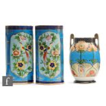 A pair of Noritake vases, each of cylindrical form decorated with stylised birds perched on